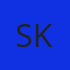 S K
