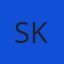S K
