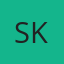 S K
