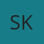 S K