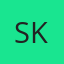 S K