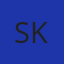 S K