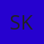 S K