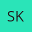S K