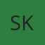 S K