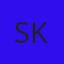 S K