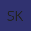 S K