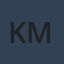 K M
