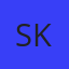 S K