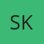 S K