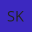 S K