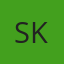 S K