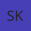 S K