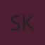 S K