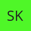 S K