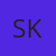 S K