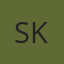 S K