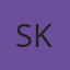 S K