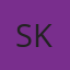 S K