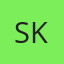 S K