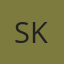 S K
