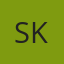 S K