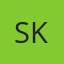 S K