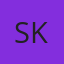 S K
