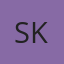 S K