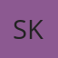 S K