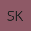 S K