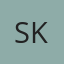 S K