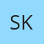S K