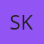 S K