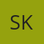 S K