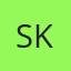 S K