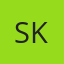 S K