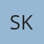 S K