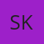 S K