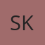 S K