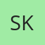 S K