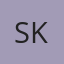 S K