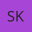 S K