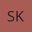 S K