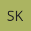 S K