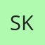 S K