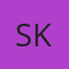 S K