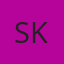 S K