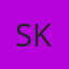S K