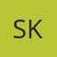 S K
